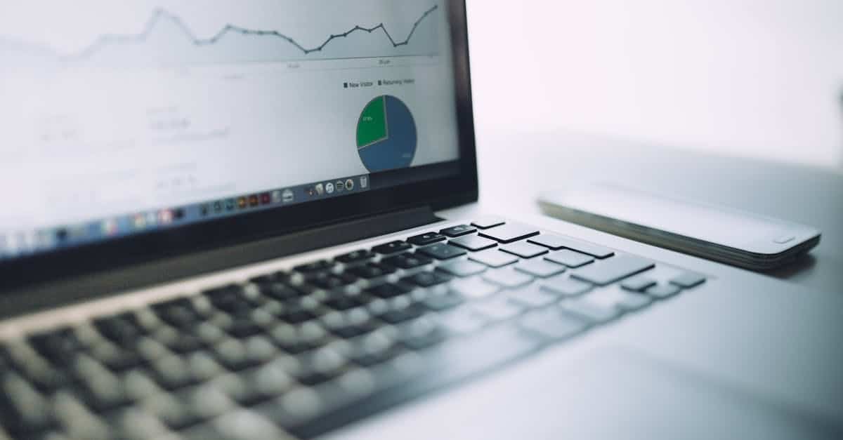 A laptop showing an analytics dashboard with charts and graphs, symbolizing modern data analysis tools.